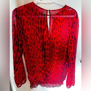 B eautiful MK blouse.